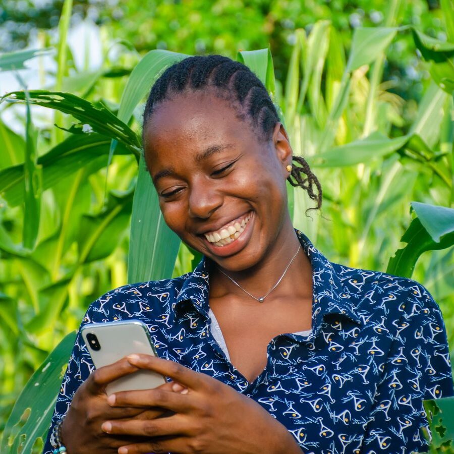 A woman farmer using a mobile phone